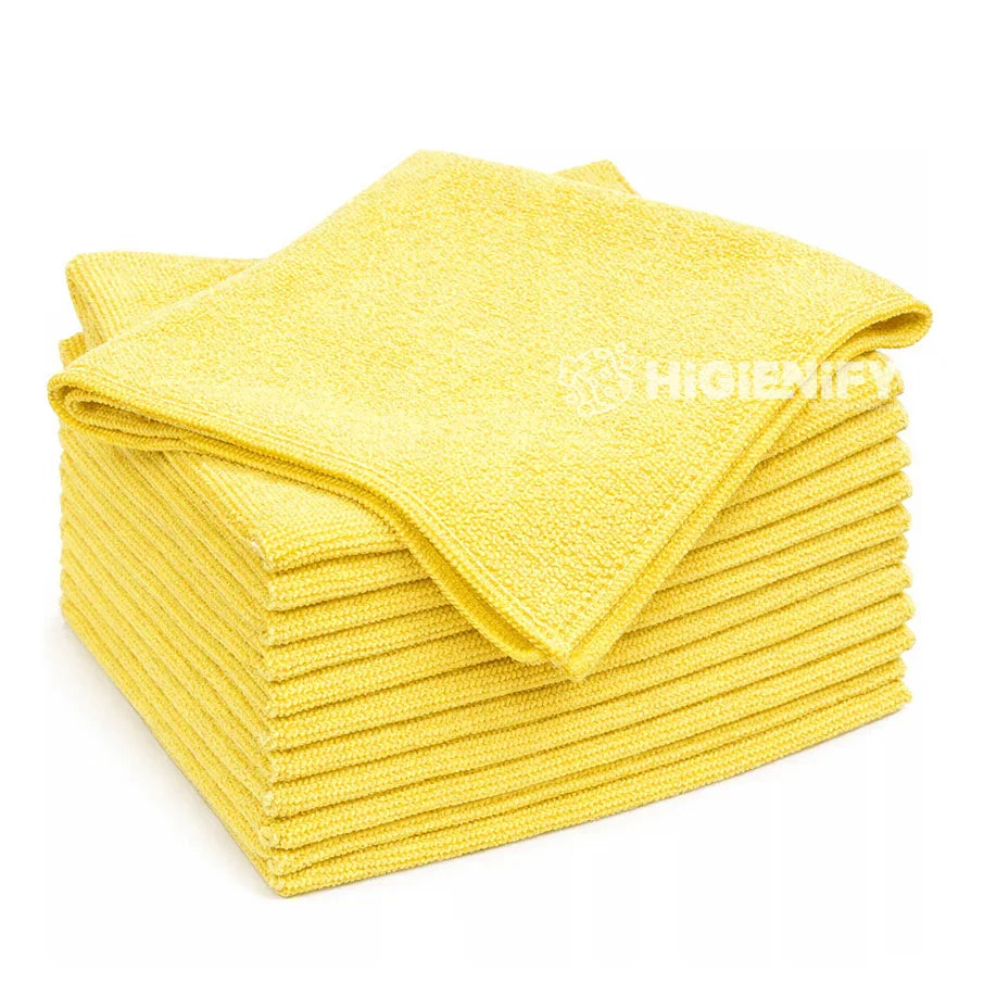 Pano Microfibra Multiusos Amarelo T-28 em pacote com 12 unidades, ideal para limpeza eficiente de todas as superfícies.